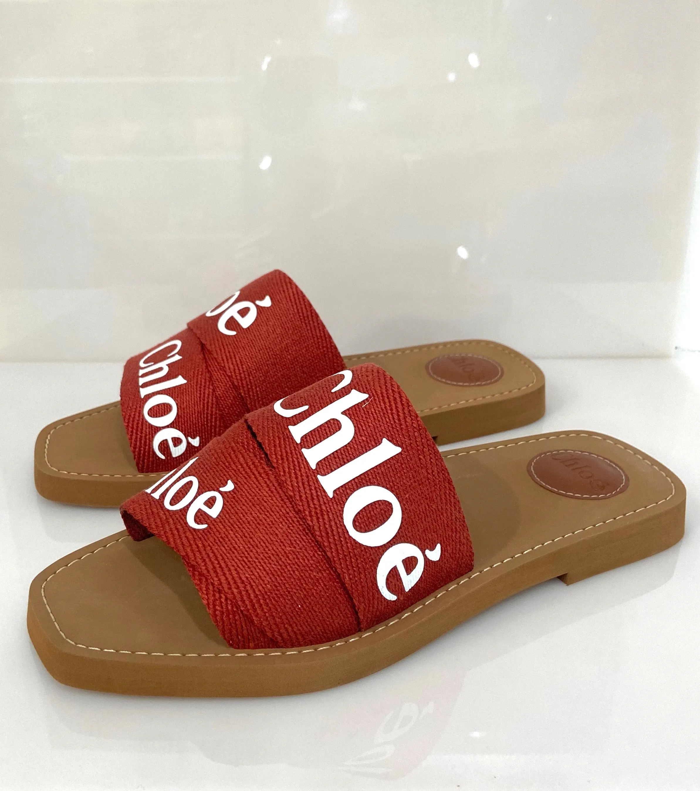 CHLOÉ LOGO PRINTED SLIP ON SLIDE SANDALS